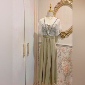 Elegant Lace Maxi Dress in Cream Avocado Green shade by Tin House